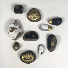 Handpainted stones from the northern Sweden and southern France.